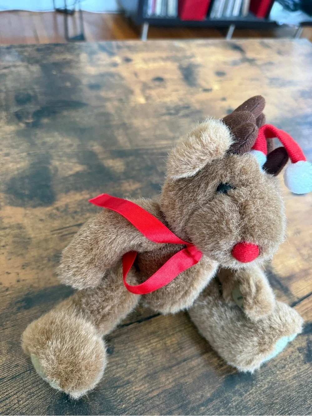 Plush Brown Reindeer Toy with Red Scarf and Santa Hat vintage
